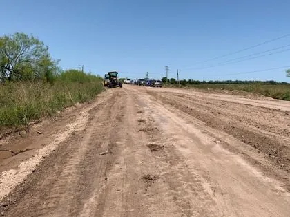 Road being shaped with road equipment